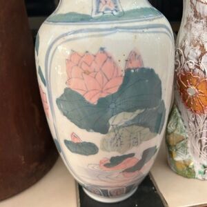 Vintage Asian vase with lotus flowers and butterflies home